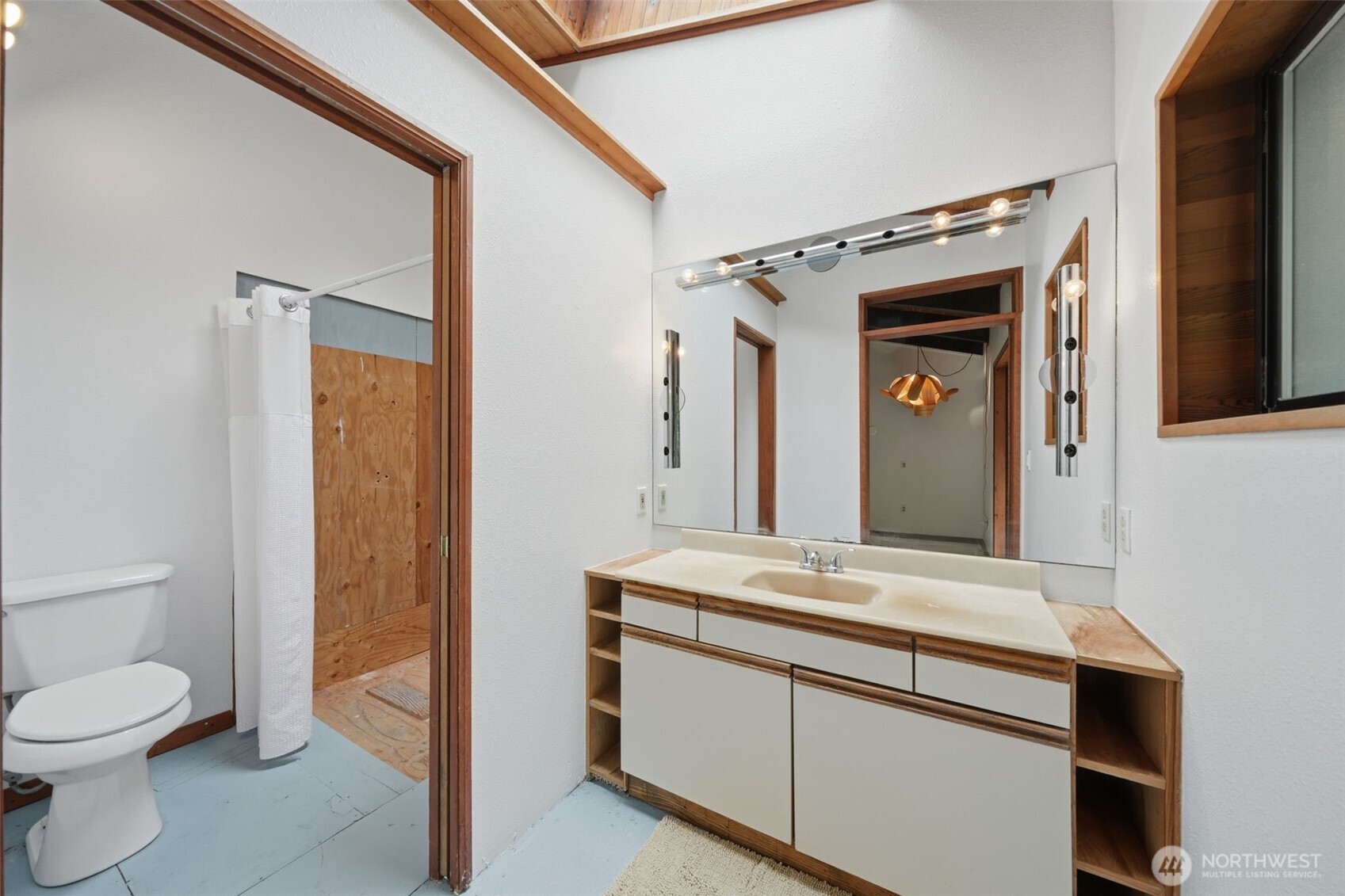 102 Byron Road Friday Harbor, WA 98250 - Photo 17 of 40 a bathroom with a sink a toilet and a mirror