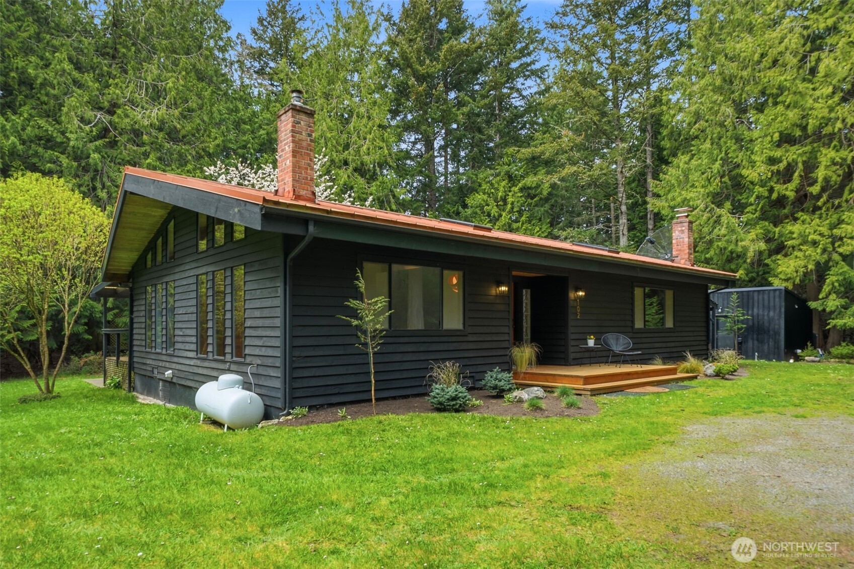102 Byron Road Friday Harbor, WA 98250 - Photo 2 of 40 a front view of house with yard