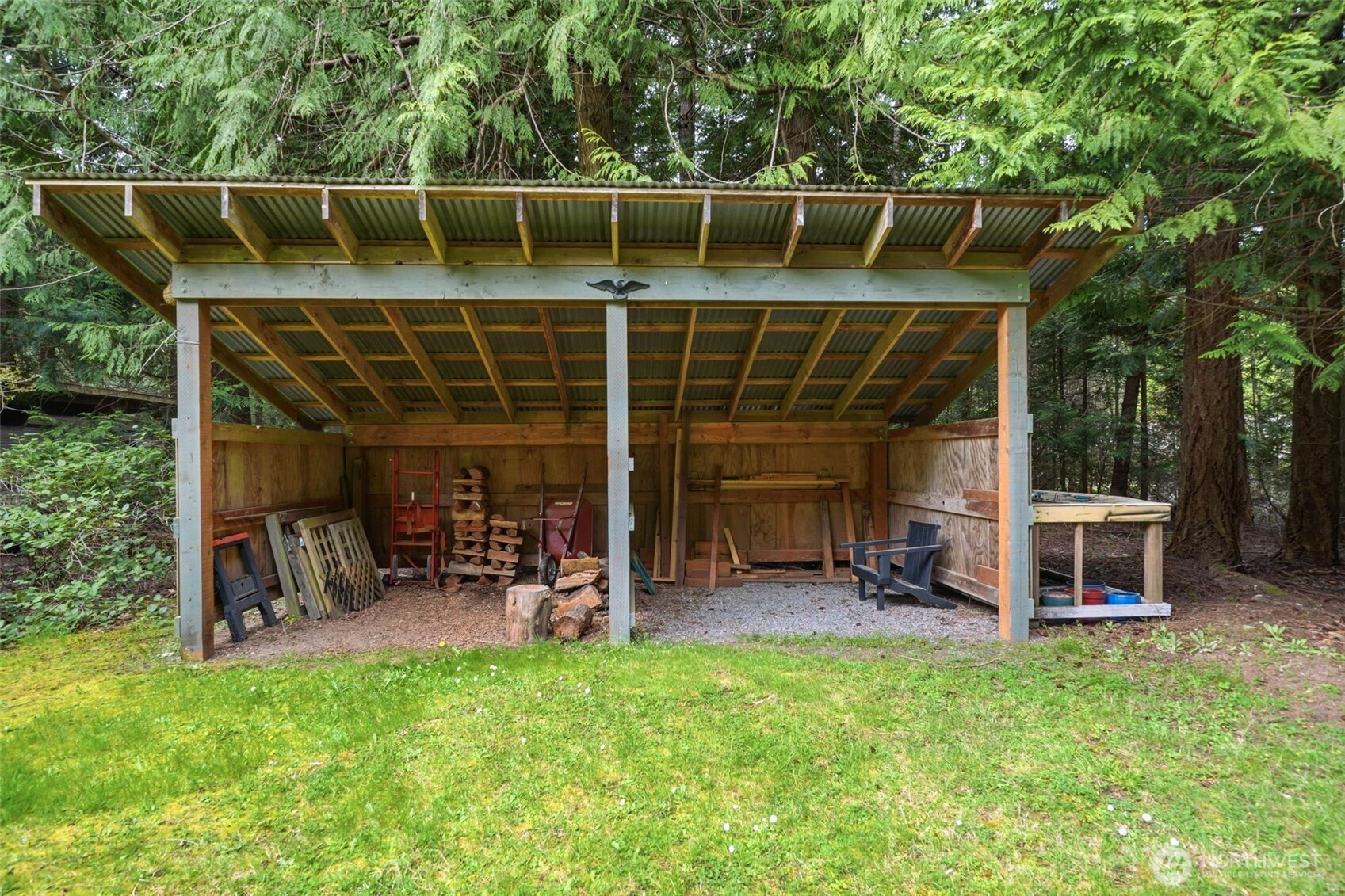102 Byron Road Friday Harbor, WA 98250 - Photo 29 of 40 a view of a chairs and table in the back yard