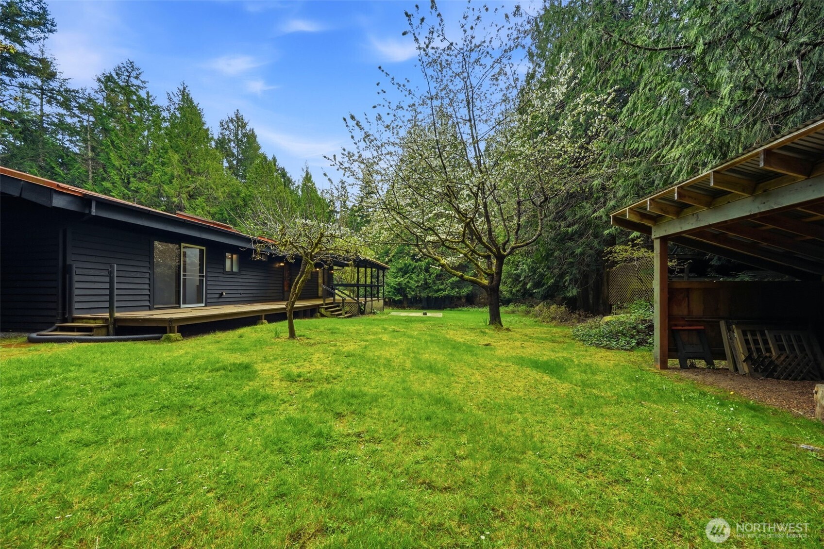 102 Byron Road Friday Harbor, WA 98250 - Photo 30 of 40 a view of a backyard with a garden