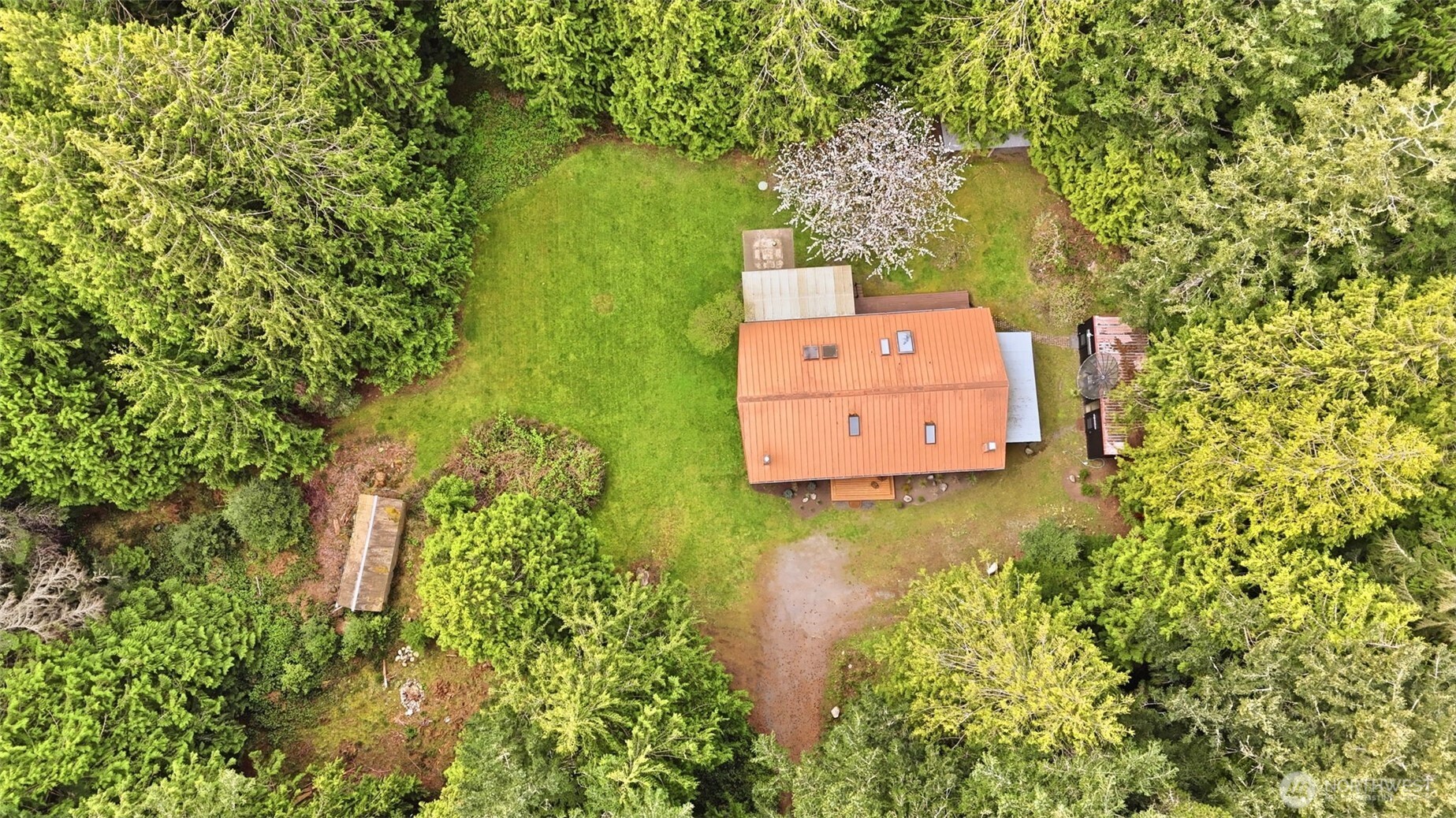 102 Byron Road Friday Harbor, WA 98250 - Photo 38 of 40 an aerial view of a house with a yard basket ball court and outdoor seating