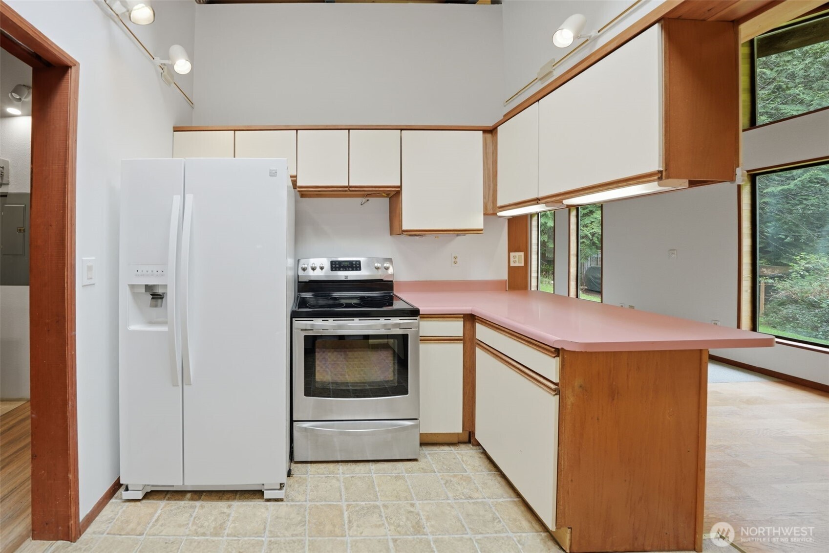 102 Byron Road Friday Harbor, WA 98250 - Photo 10 of 40 a kitchen with a stove and a refrigerator