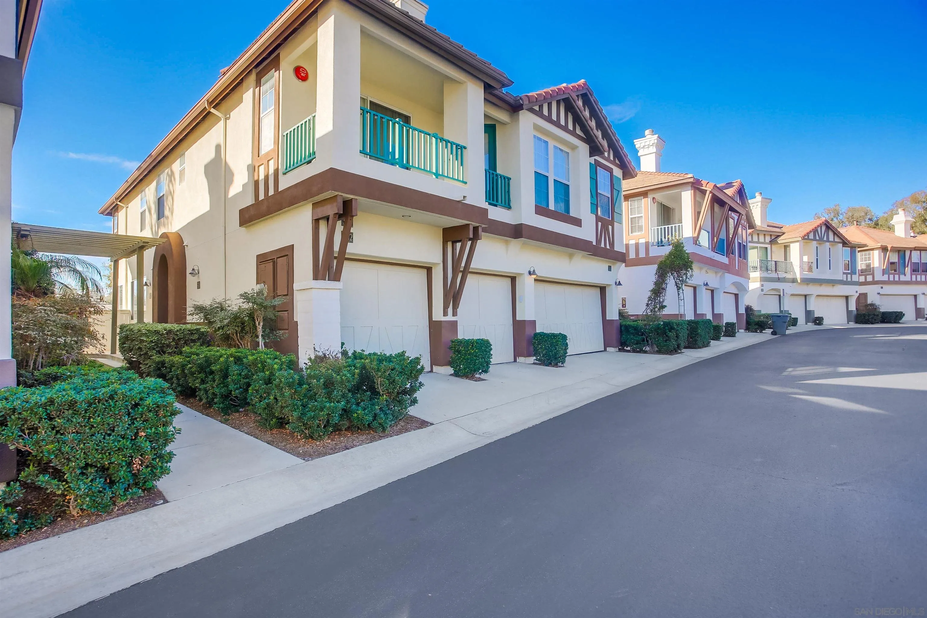 382 Carmel Creeper Place Encinitas, CA 92024 - Photo 1 of 43 a front view of a house with a street