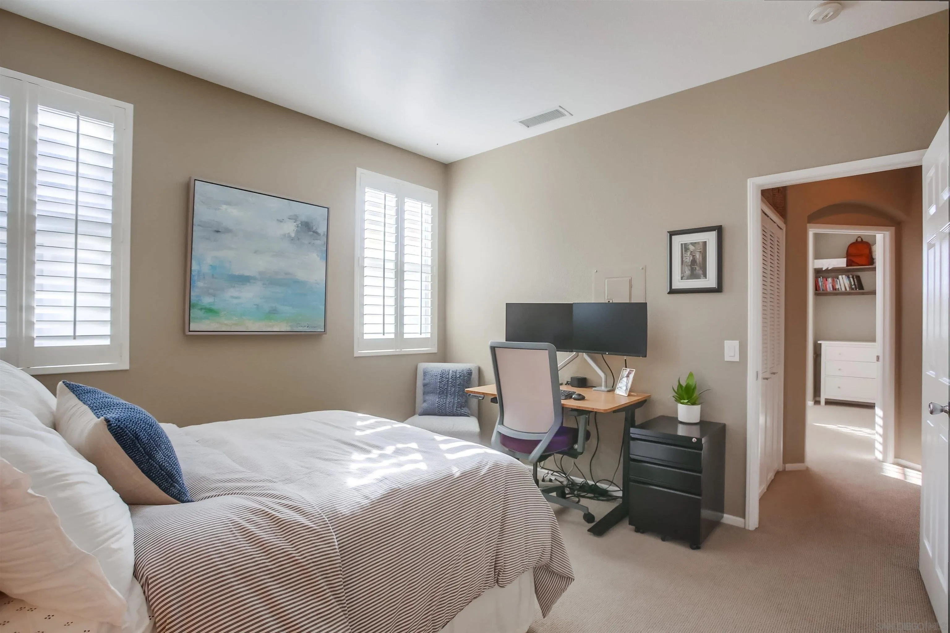 382 Carmel Creeper Place Encinitas, CA 92024 - Photo 23 of 43 a bedroom with bed and window