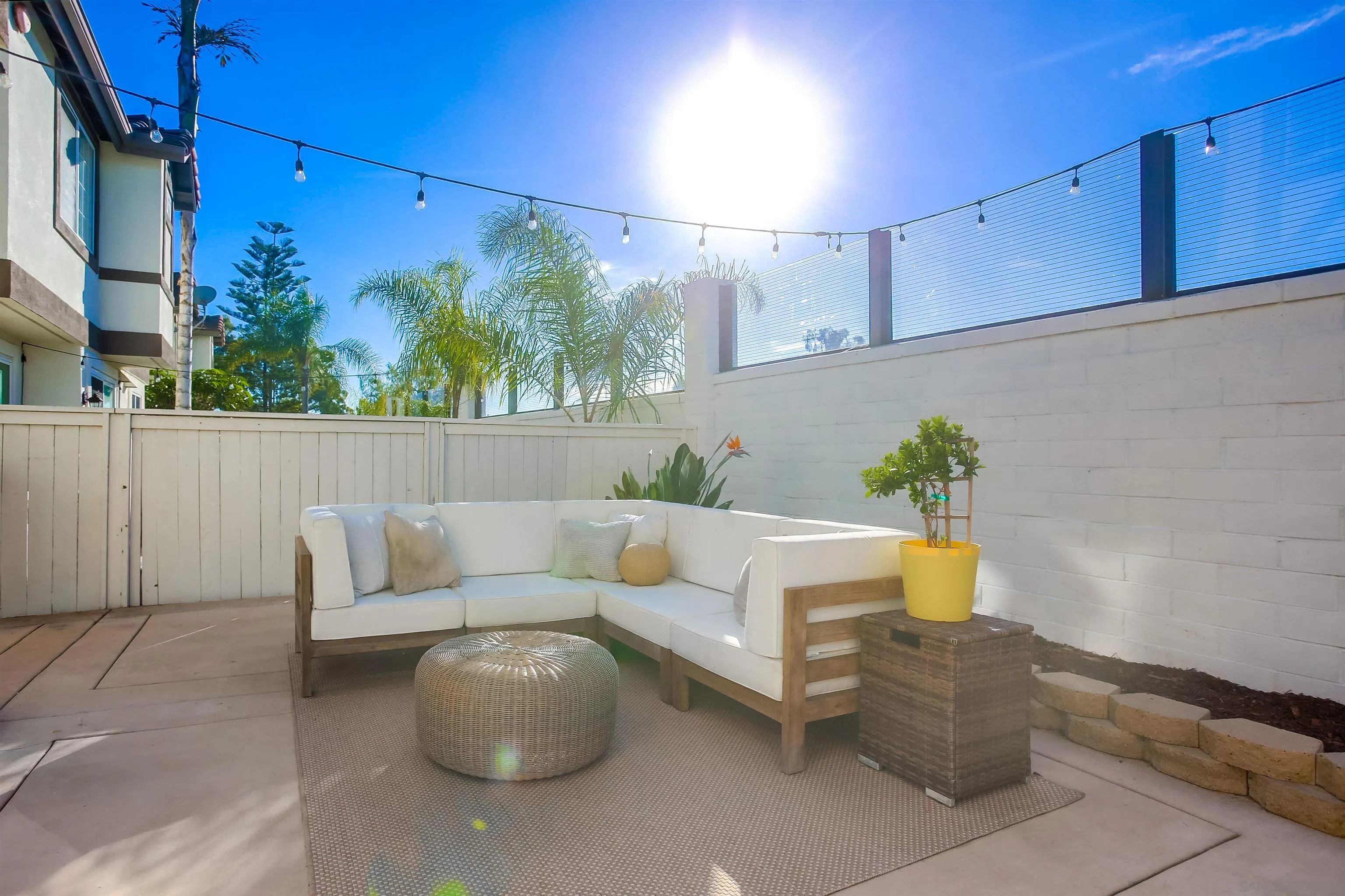382 Carmel Creeper Place Encinitas, CA 92024 - Photo 36 of 43 a outdoor living space with furniture and a potted plant