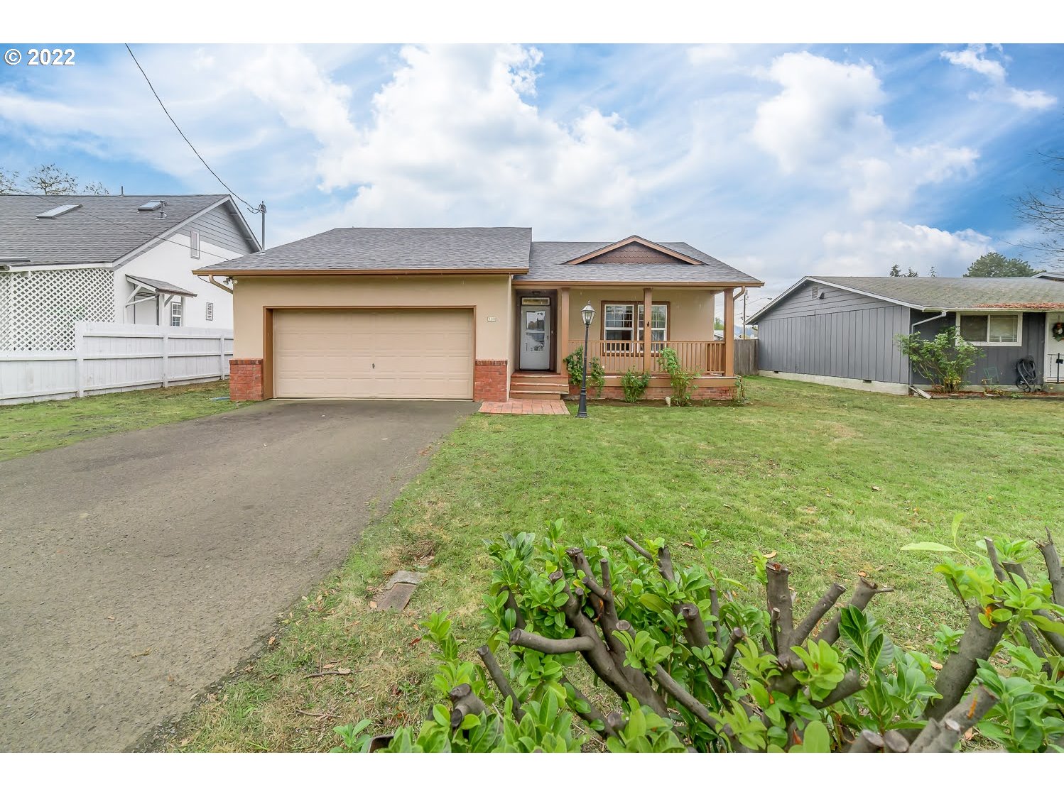 331 South 46th Street Springfield, OR 97478 - Photo 1 of 28 a view of a yard in front of a house with a big yard