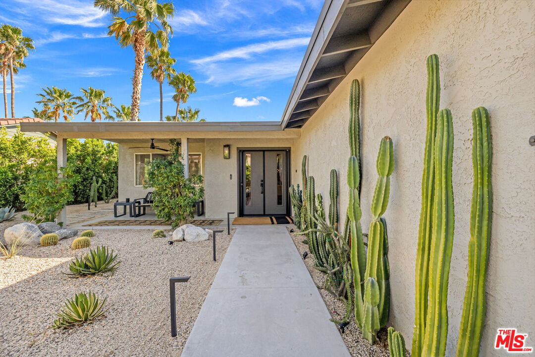 66869 San Ardo Road Desert Hot Springs, CA 92240 - Photo 2 of 39 a view of a house with a garden