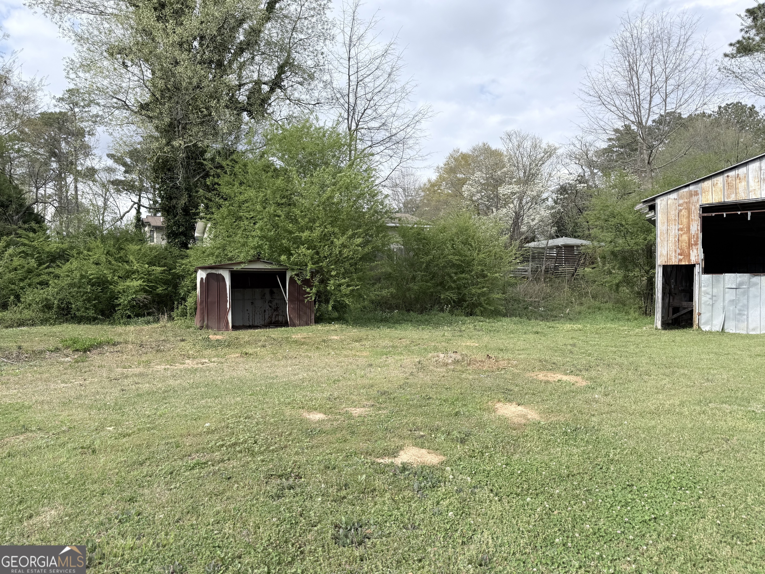 605 Perryman Bridge Road Heflin, AL 36264 - Photo 43 of 52 a backyard of a house with lots of green space