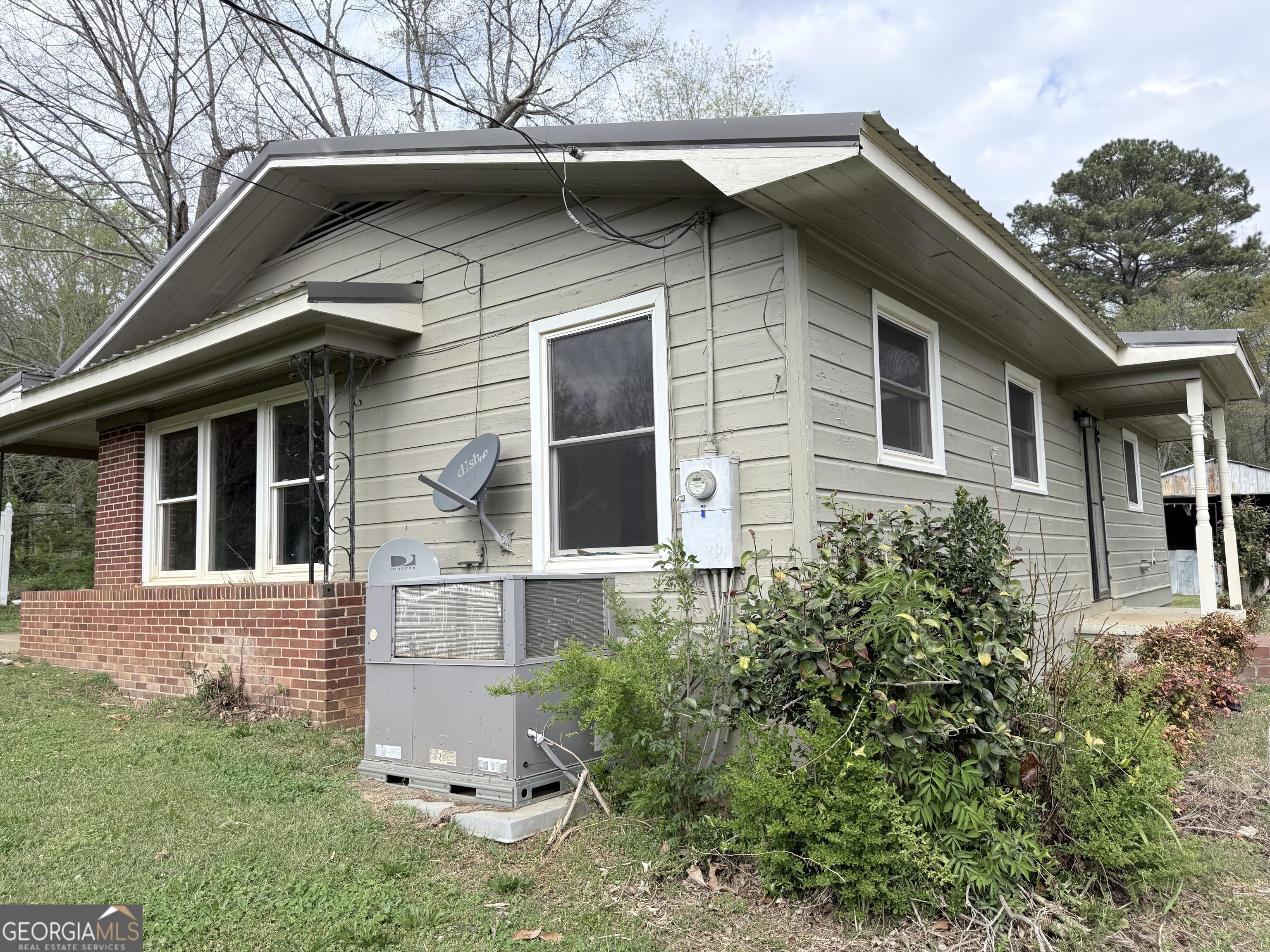 605 Perryman Bridge Road Heflin, AL 36264 - Photo 47 of 52 a front view of a house with a yard