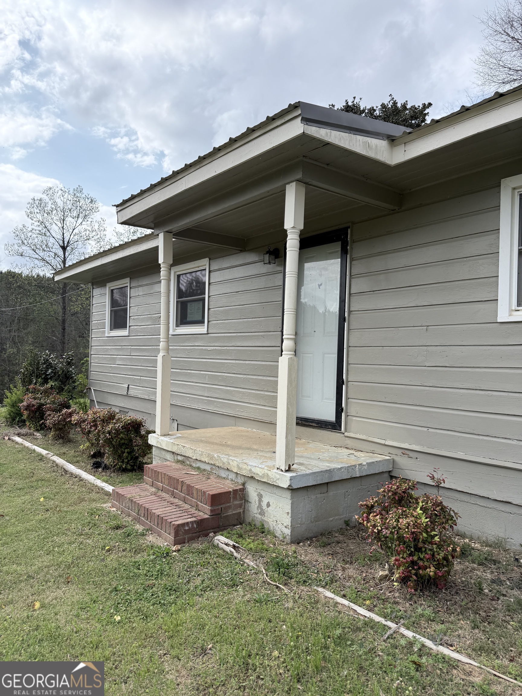 605 Perryman Bridge Road Heflin, AL 36264 - Photo 49 of 52 a backyard of a house with lots of green space