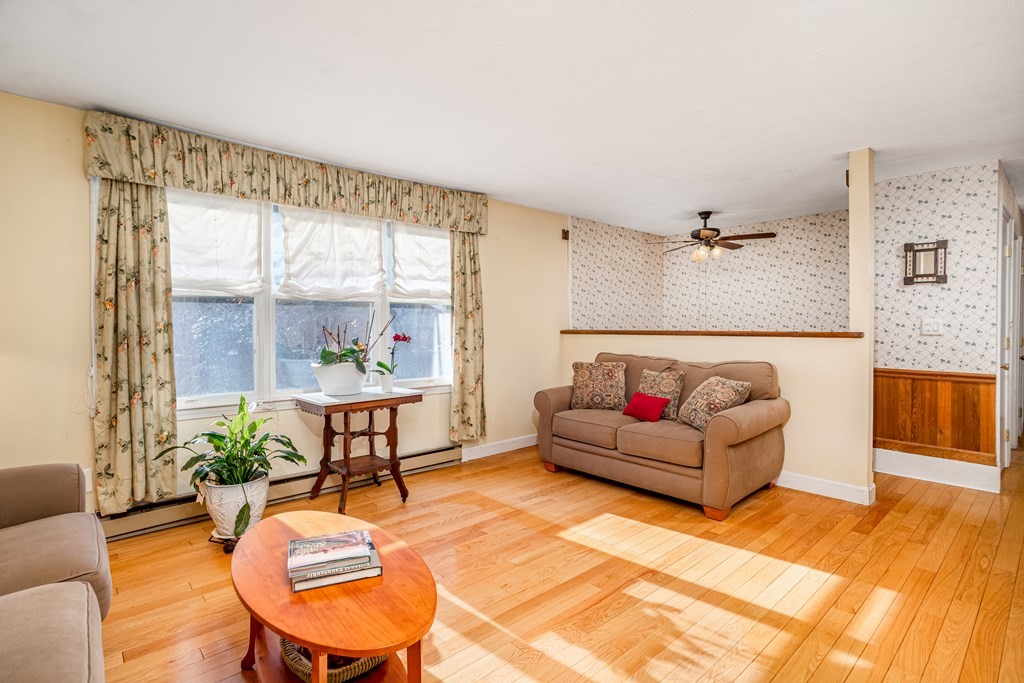 155 Groton Road Shirley, MA 01464 - Photo 13 of 42 a living room with furniture and a large window