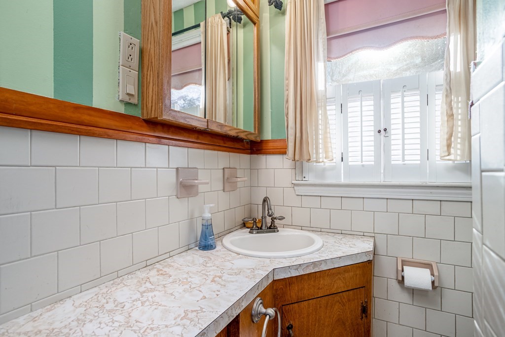 155 Groton Road Shirley, MA 01464 - Photo 19 of 42 a bathroom with a sink and a mirror