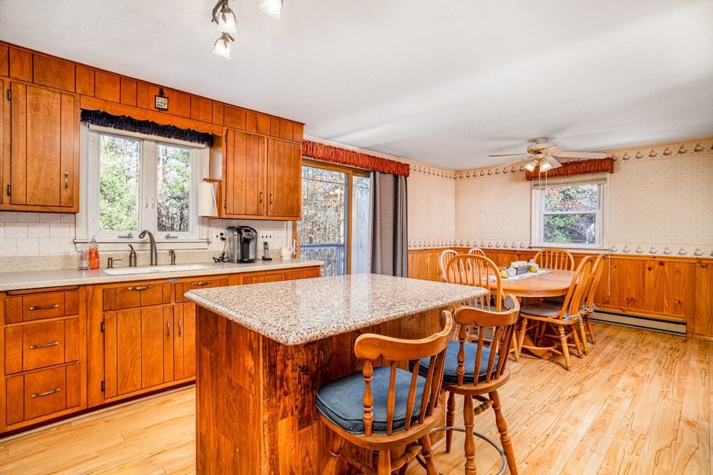 155 Groton Road Shirley, MA 01464 - Photo 2 of 42 a view of a dining room with furniture window and wooden floor