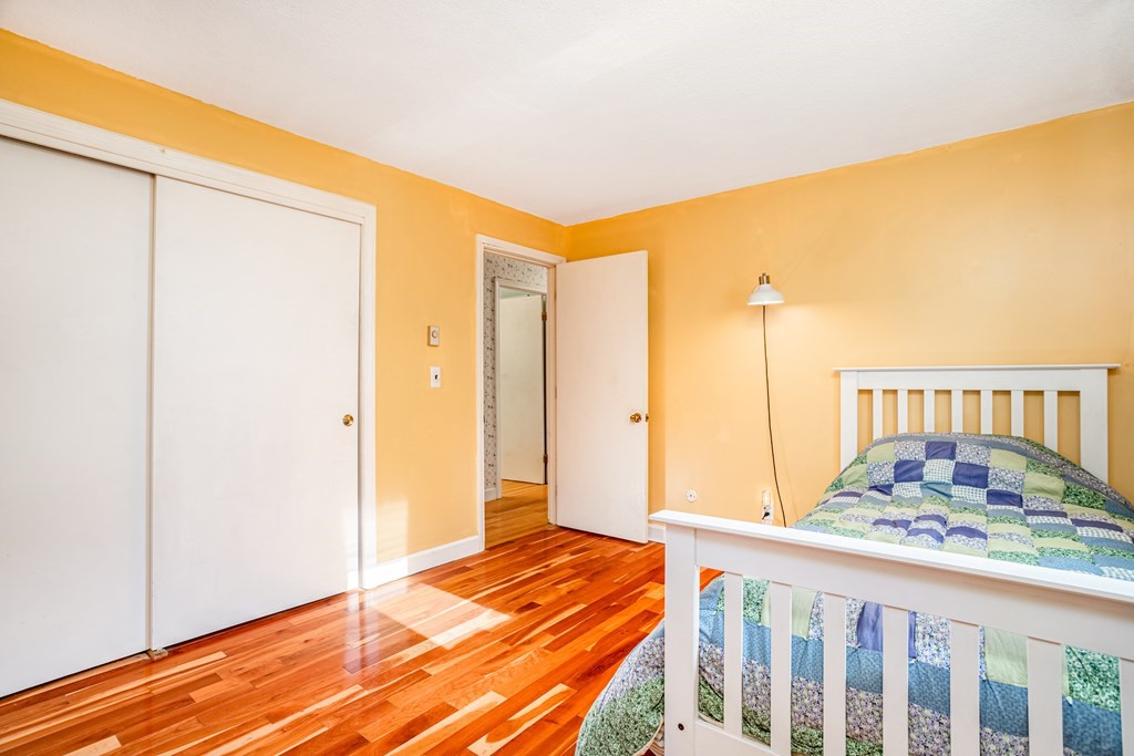 155 Groton Road Shirley, MA 01464 - Photo 21 of 42 a bedroom with a bed and a window