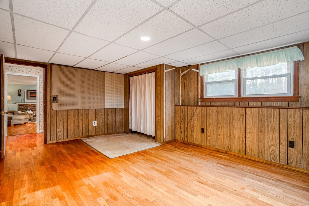 155 Groton Road Shirley, MA 01464 - Photo 27 of 42 a view of an empty room with wooden floor
