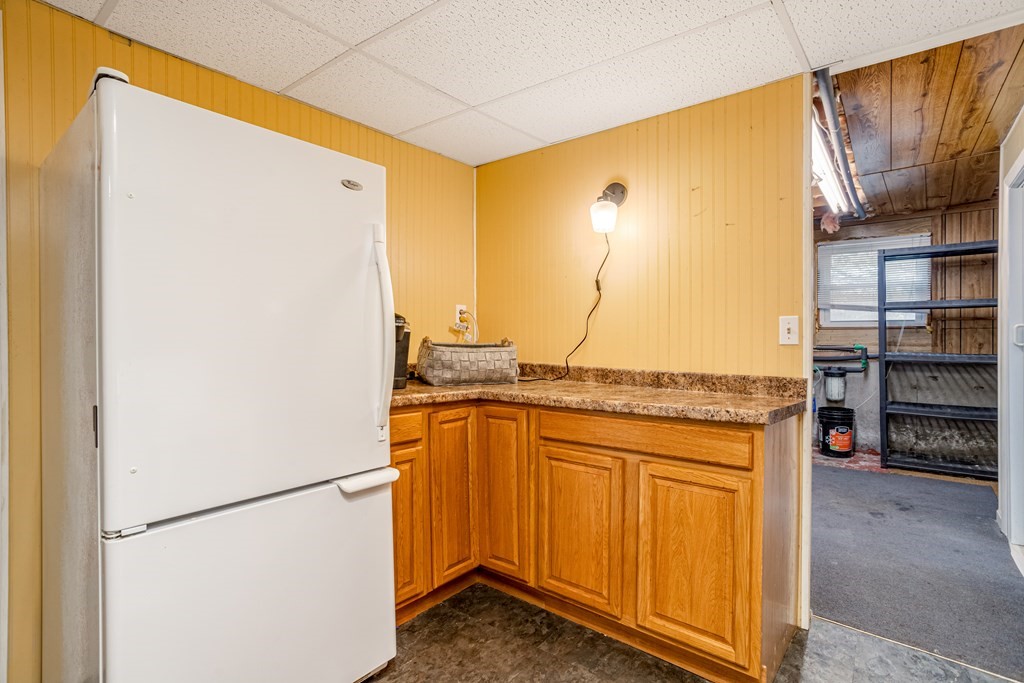 155 Groton Road Shirley, MA 01464 - Photo 30 of 42 a kitchen with stainless steel appliances granite countertop a refrigerator and a sink