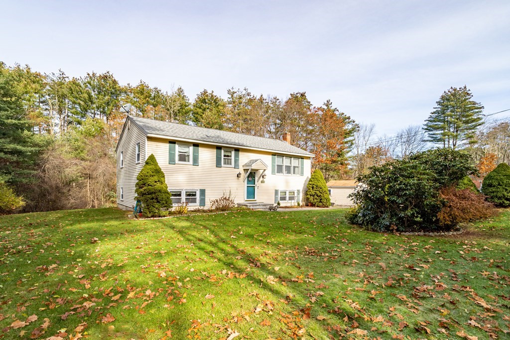 155 Groton Road Shirley, MA 01464 - Photo 37 of 42 a view of a house with a big yard and potted plants