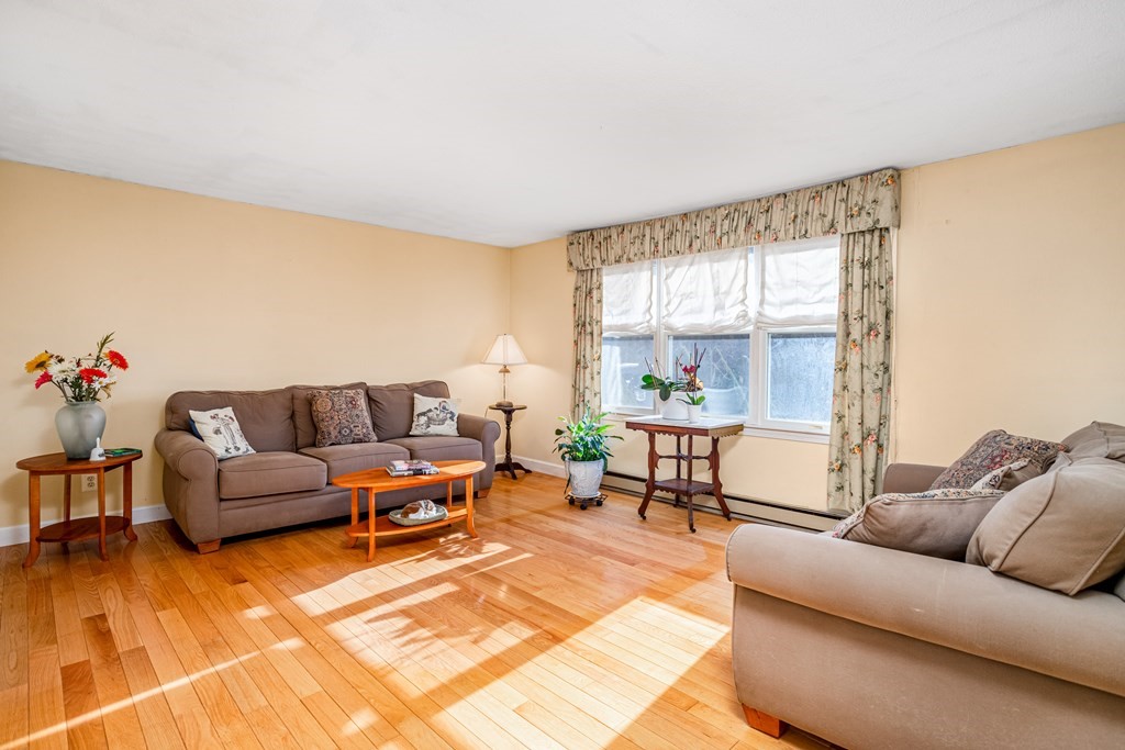 155 Groton Road Shirley, MA 01464 - Photo 4 of 42 a living room with furniture and a large window