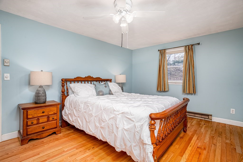 155 Groton Road Shirley, MA 01464 - Photo 5 of 42 a bedroom with a bed and a window