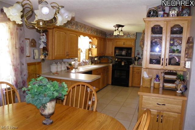 6096 South Cleveland Massillon Road Clinton, OH 44216 - Photo 10 of 25 View of dining area & kitchen