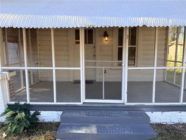a front view of a house with a window