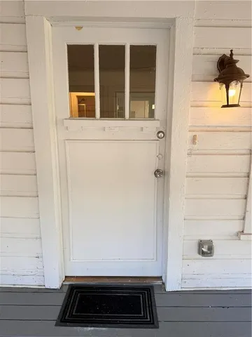 a view of kitchen with a sink and a window