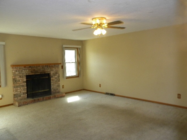 617 Pin Oak Road Rockton, IL 61072 - Photo 4 of 25 a view of a livingroom with a fireplace