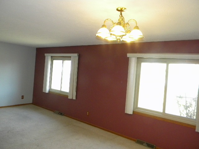 617 Pin Oak Road Rockton, IL 61072 - Photo 8 of 25 a view of an empty room with a window