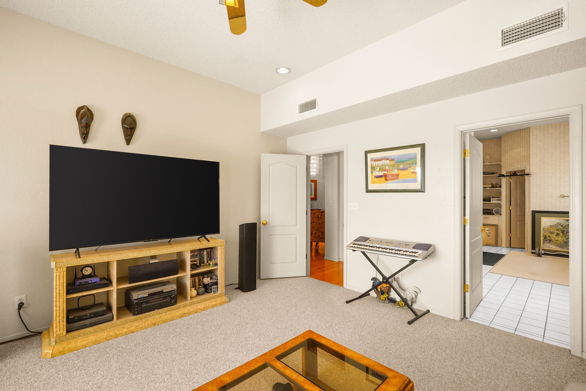 6574 Eagle Ridge Drive El Paso, TX 79912 - Photo 12 of 50 a living room with furniture and a flat screen tv
