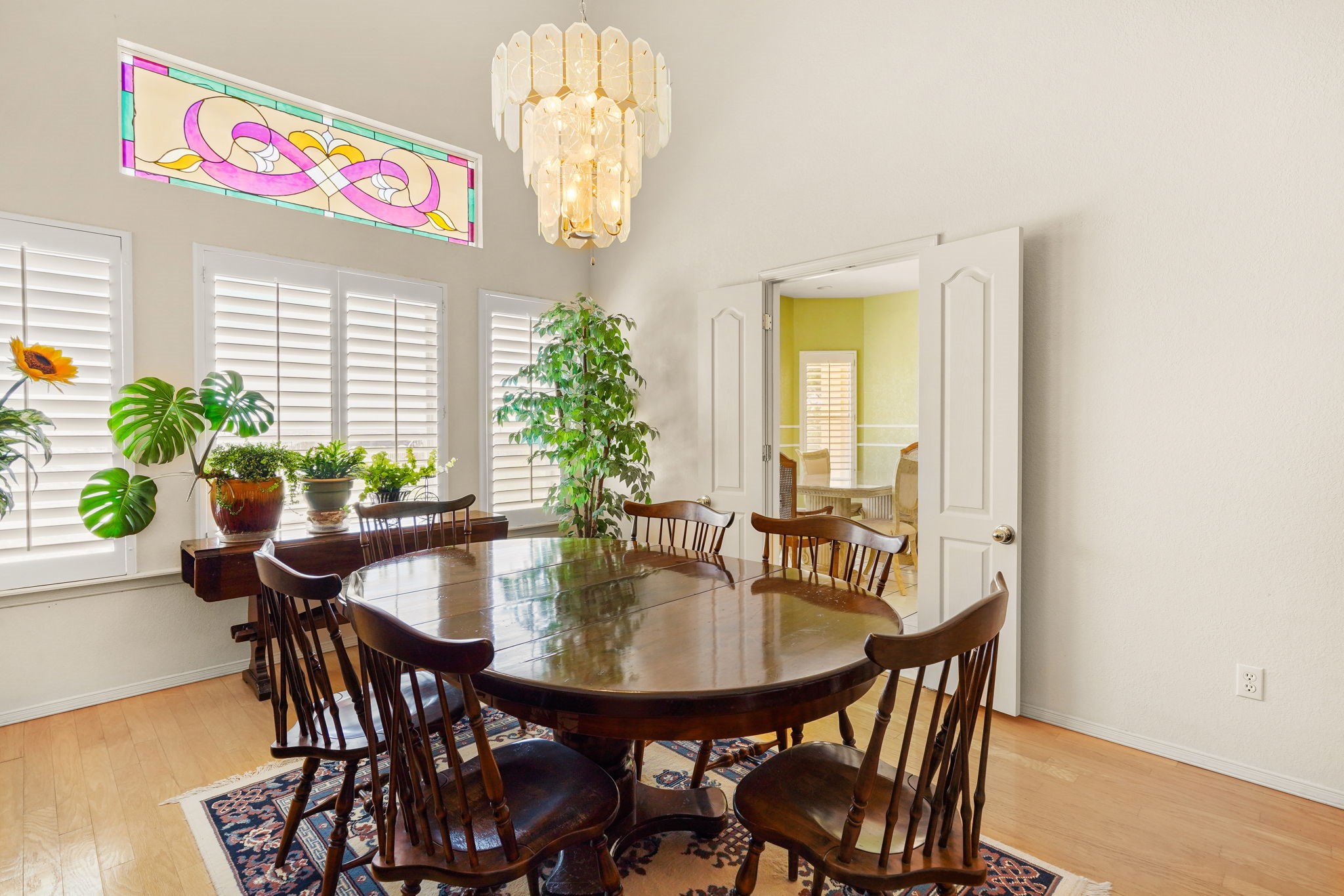 6574 Eagle Ridge Drive El Paso, TX 79912 - Photo 17 of 50 a view of a dining room with furniture and a potted plant