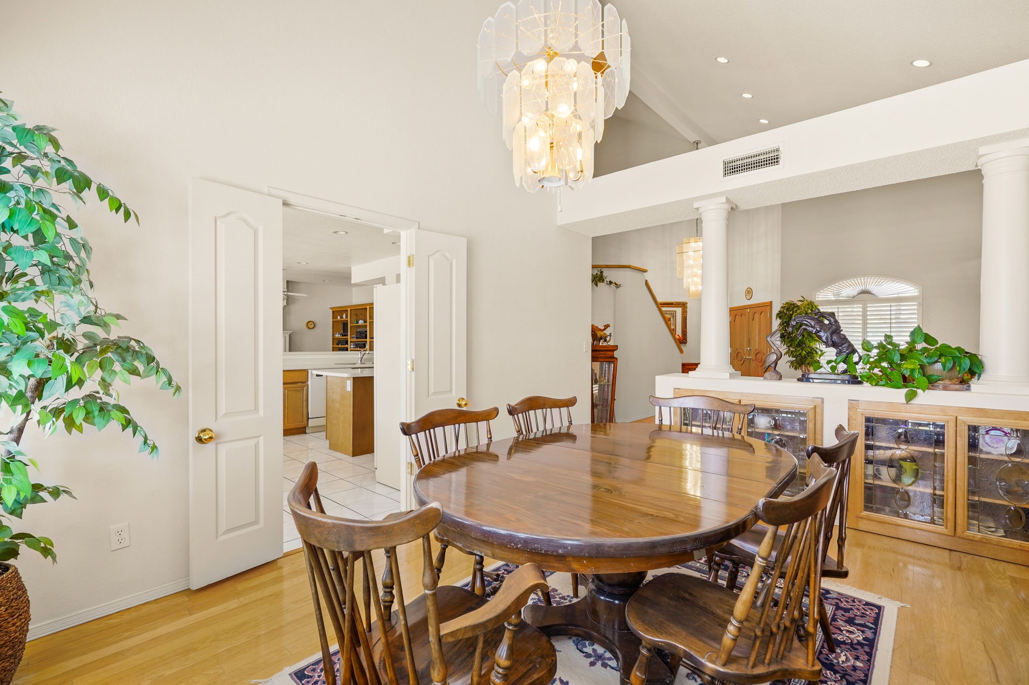 6574 Eagle Ridge Drive El Paso, TX 79912 - Photo 18 of 50 a view of a dining room with furniture and wooden floor