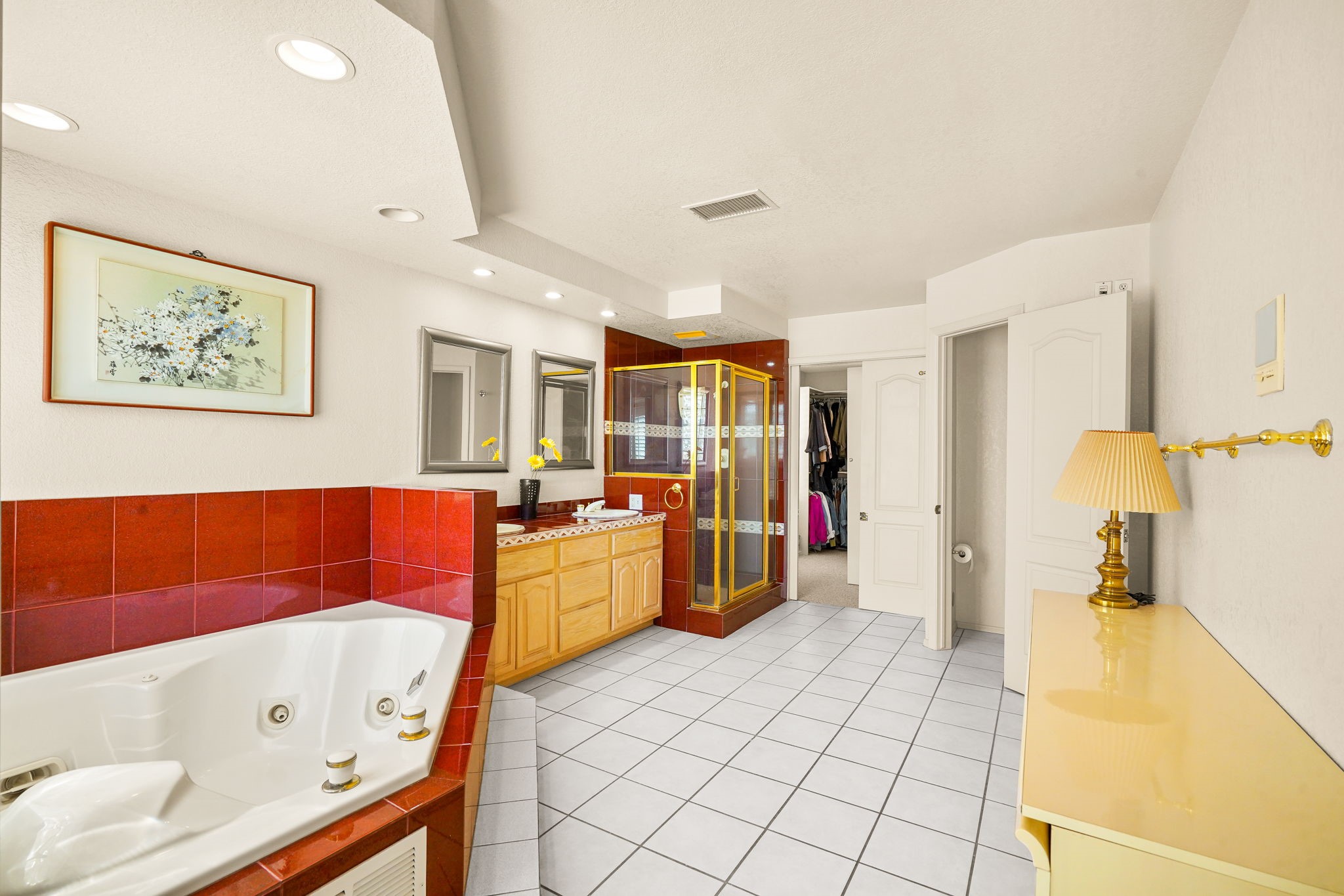 6574 Eagle Ridge Drive El Paso, TX 79912 - Photo 34 of 50 a large spacious bathroom with a tub sink and mirror