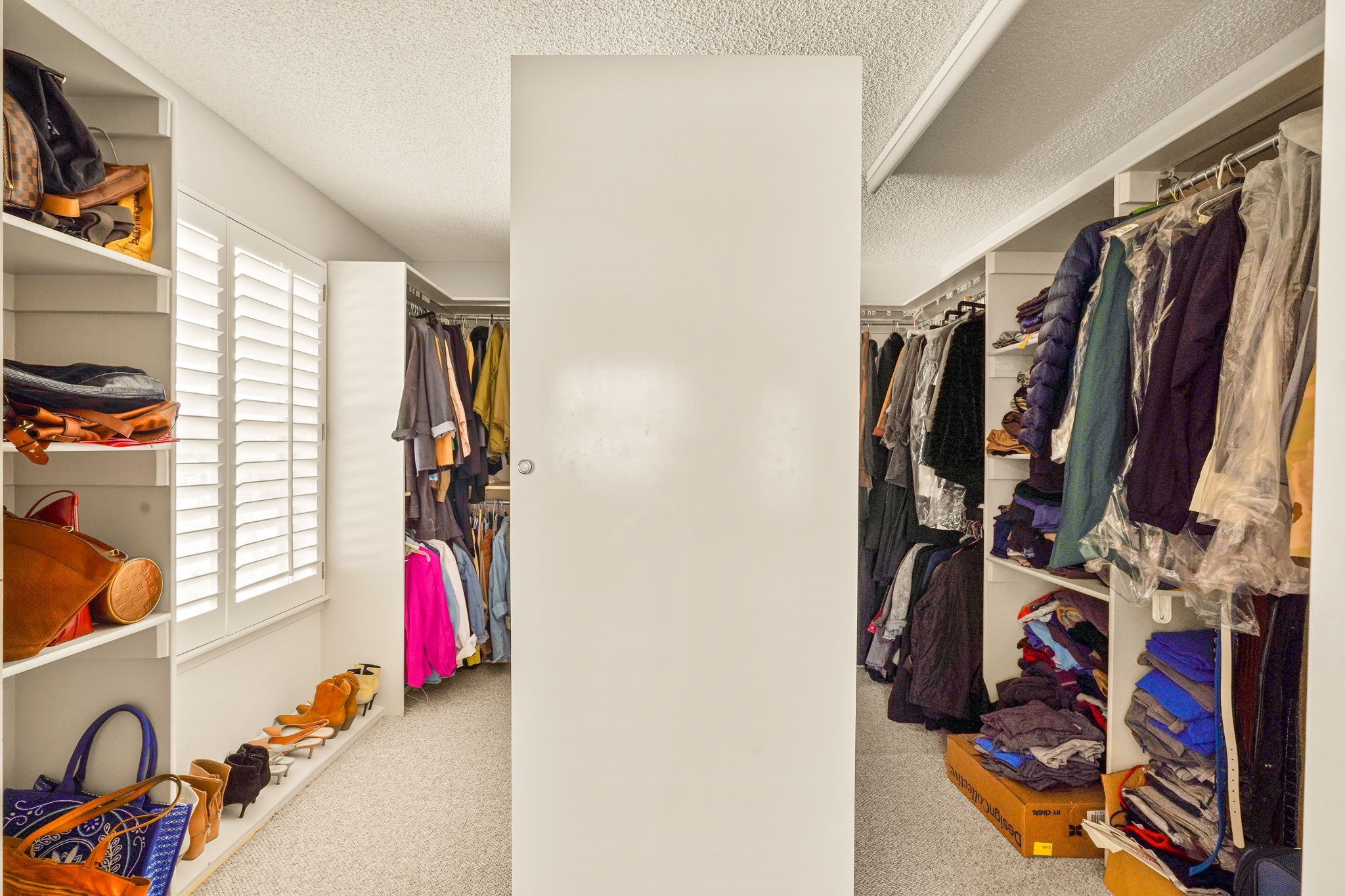 6574 Eagle Ridge Drive El Paso, TX 79912 - Photo 36 of 50 a view of walk in closet with clothes and shoes