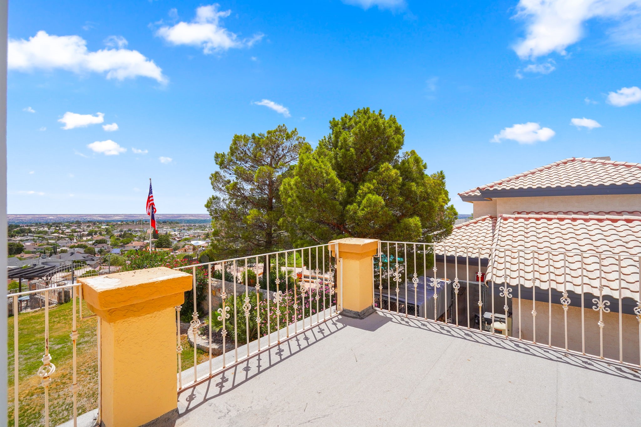 6574 Eagle Ridge Drive El Paso, TX 79912 - Photo 37 of 50 a view of a balcony with wooden floor