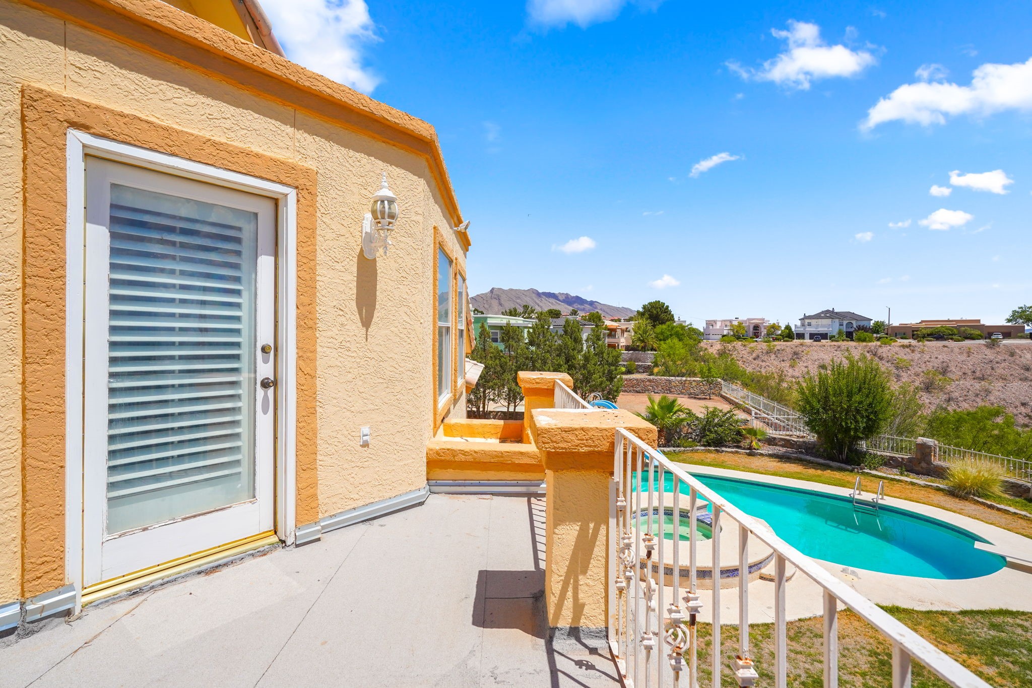 6574 Eagle Ridge Drive El Paso, TX 79912 - Photo 39 of 50 a balcony with furniture and city view