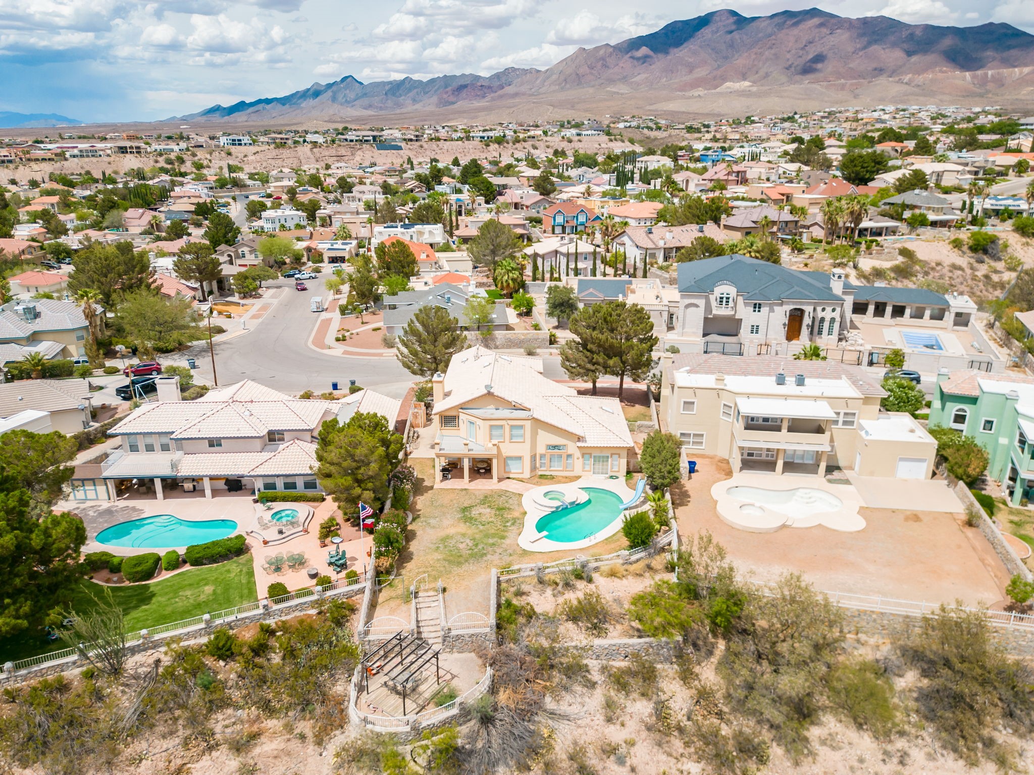6574 Eagle Ridge Drive El Paso, TX 79912 - Photo 49 of 50 an aerial view of residential houses with outdoor space
