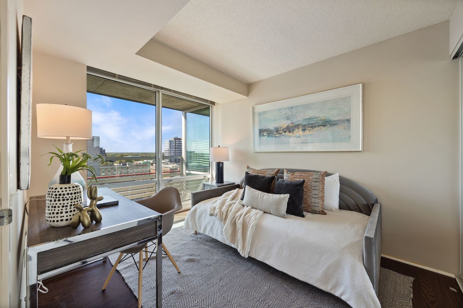 800 Elgin Road, Unit 1218 Evanston, IL 60201 - Photo 12 of 26 a living room with furniture and a window