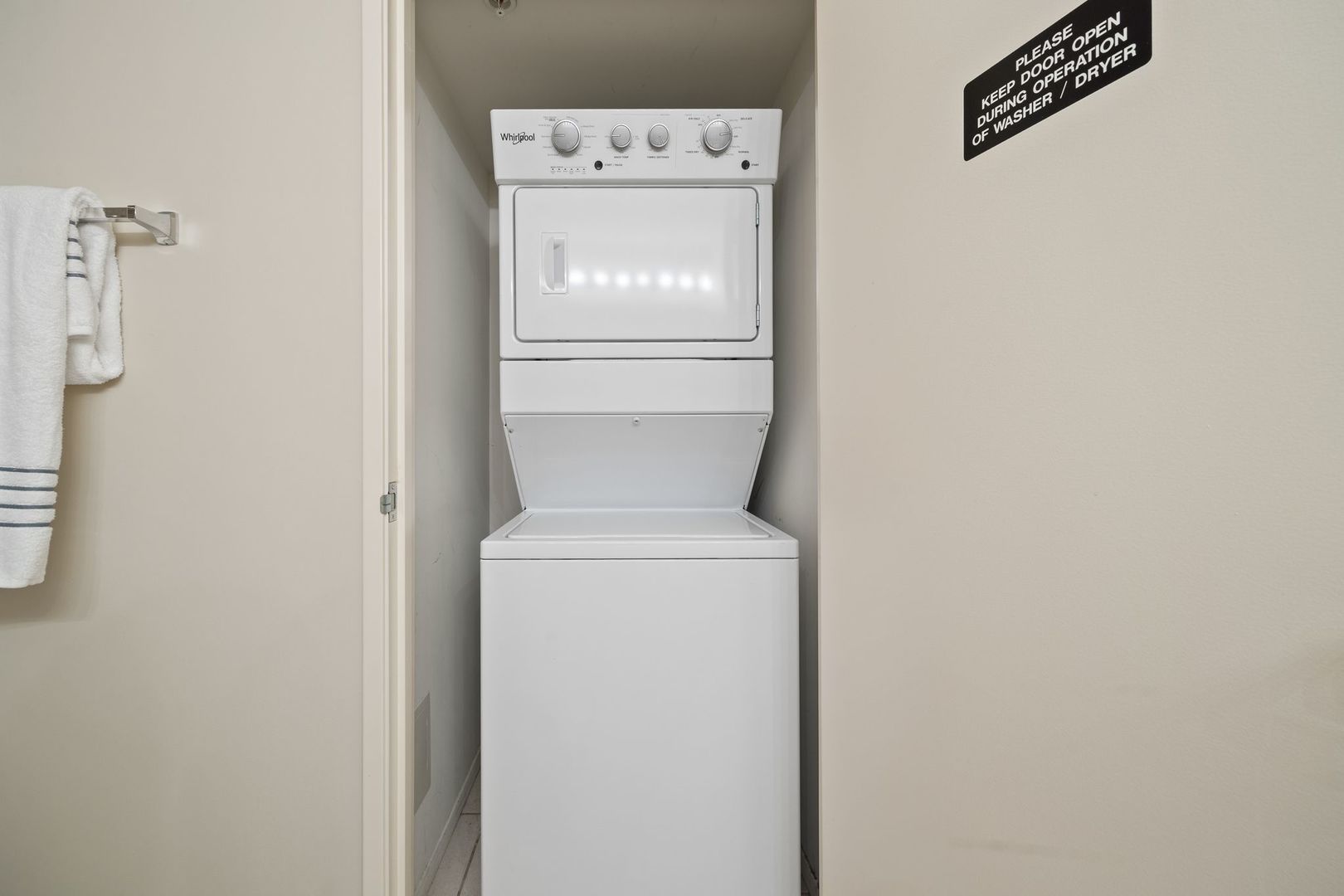 800 Elgin Road, Unit 1218 Evanston, IL 60201 - Photo 16 of 26 a utility room with dryer and washer