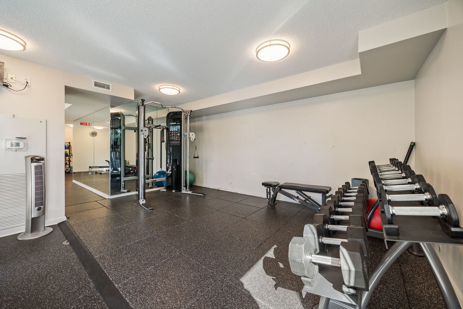 800 Elgin Road, Unit 1218 Evanston, IL 60201 - Photo 21 of 26 a view of a room with gym equipment
