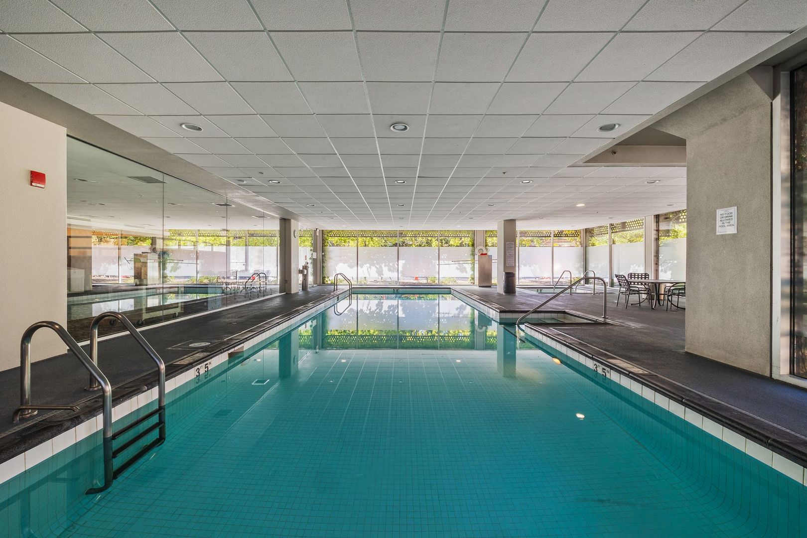 800 Elgin Road, Unit 1218 Evanston, IL 60201 - Photo 22 of 26 a view of a swimming pool with a patio