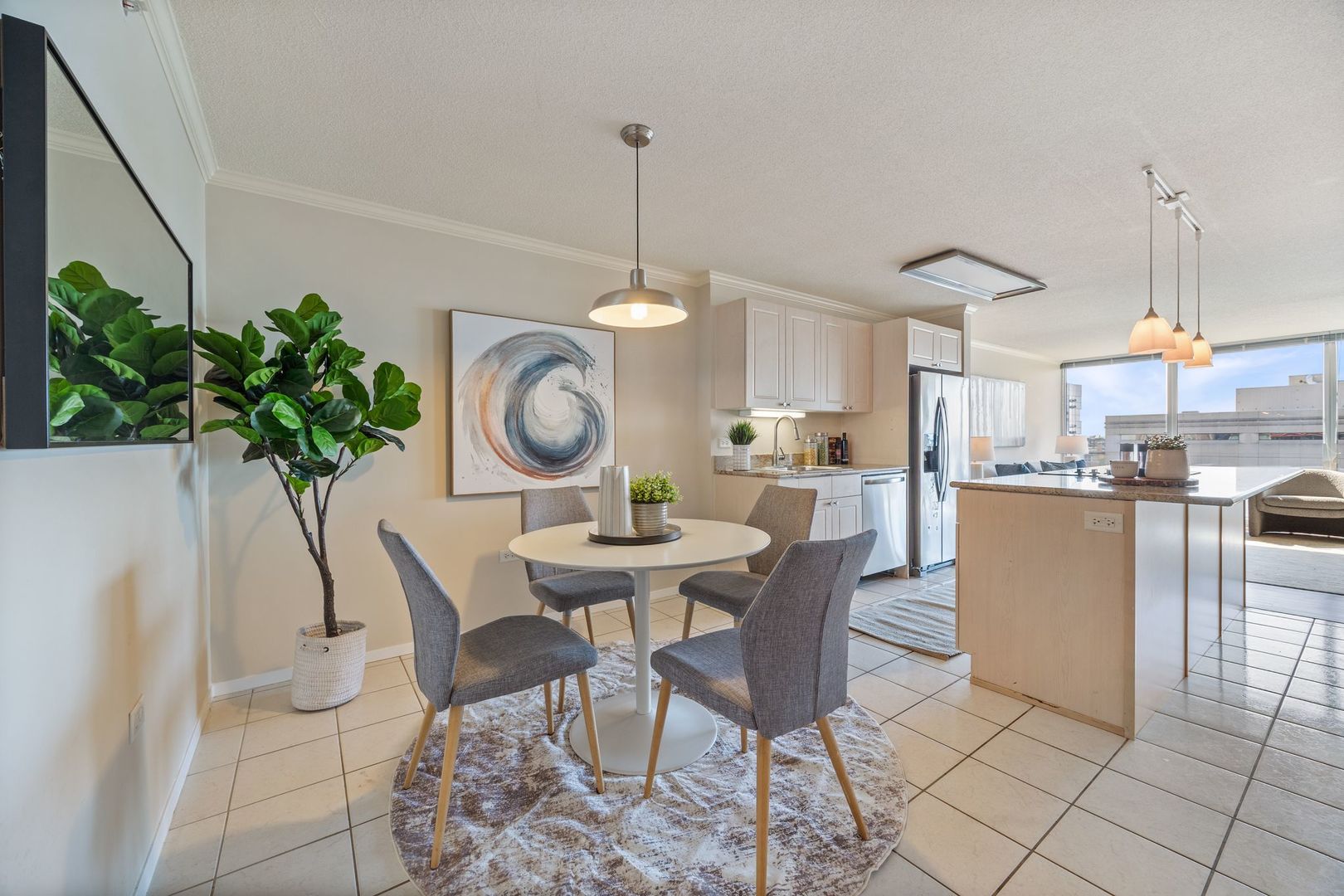 800 Elgin Road, Unit 1218 Evanston, IL 60201 - Photo 8 of 26 a view of a dining room that has a table and chairs in it