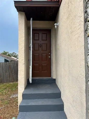 a bathroom with a sink vanity granite and toilet