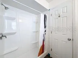 a view of a patio with a tv on the wall