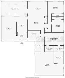 a view of empty room with wooden floor and window