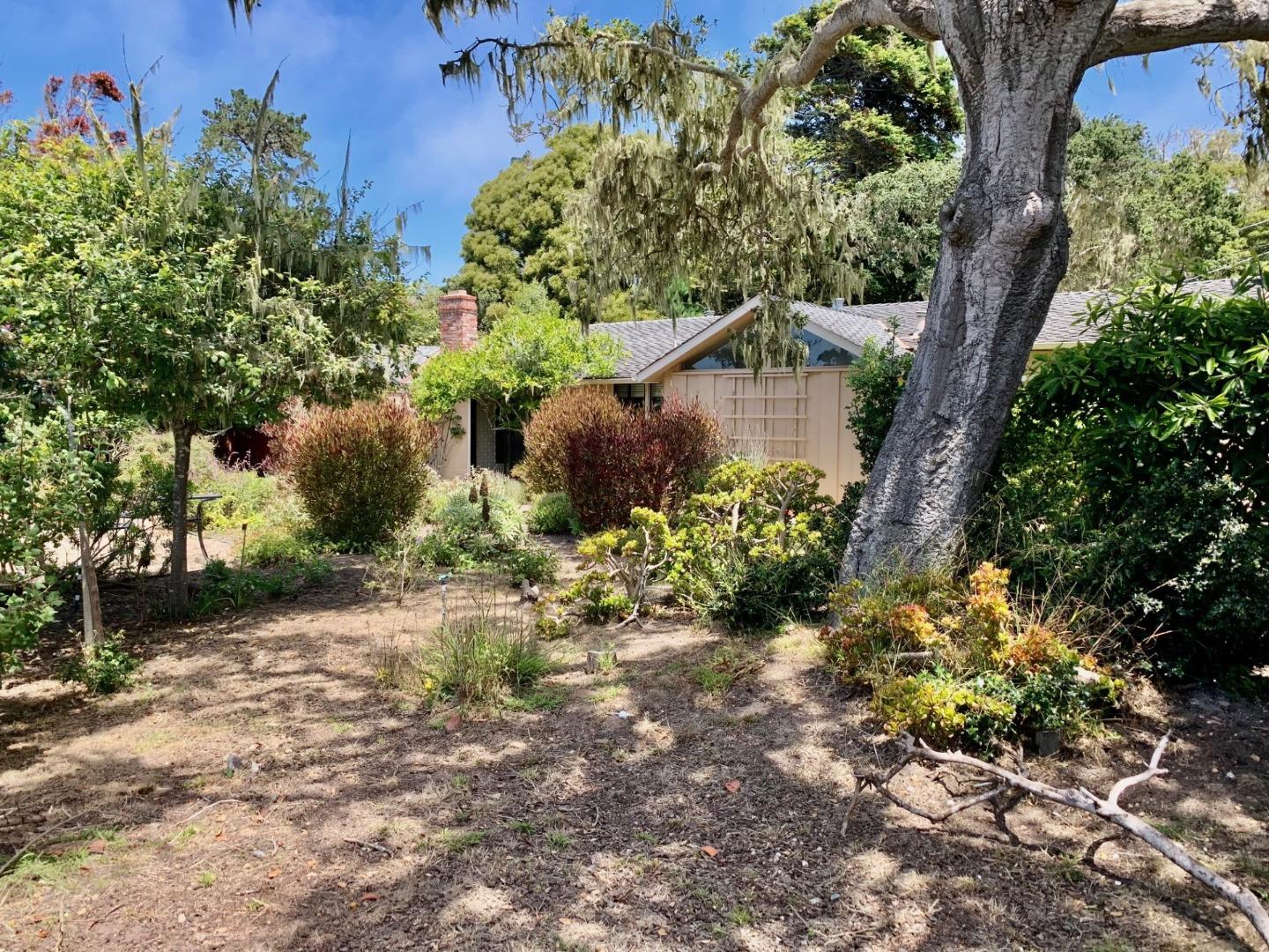 1012 San Carlos Road Pebble Beach, CA 93953 - Photo 14 of 20 an aerial view of a house with a yard