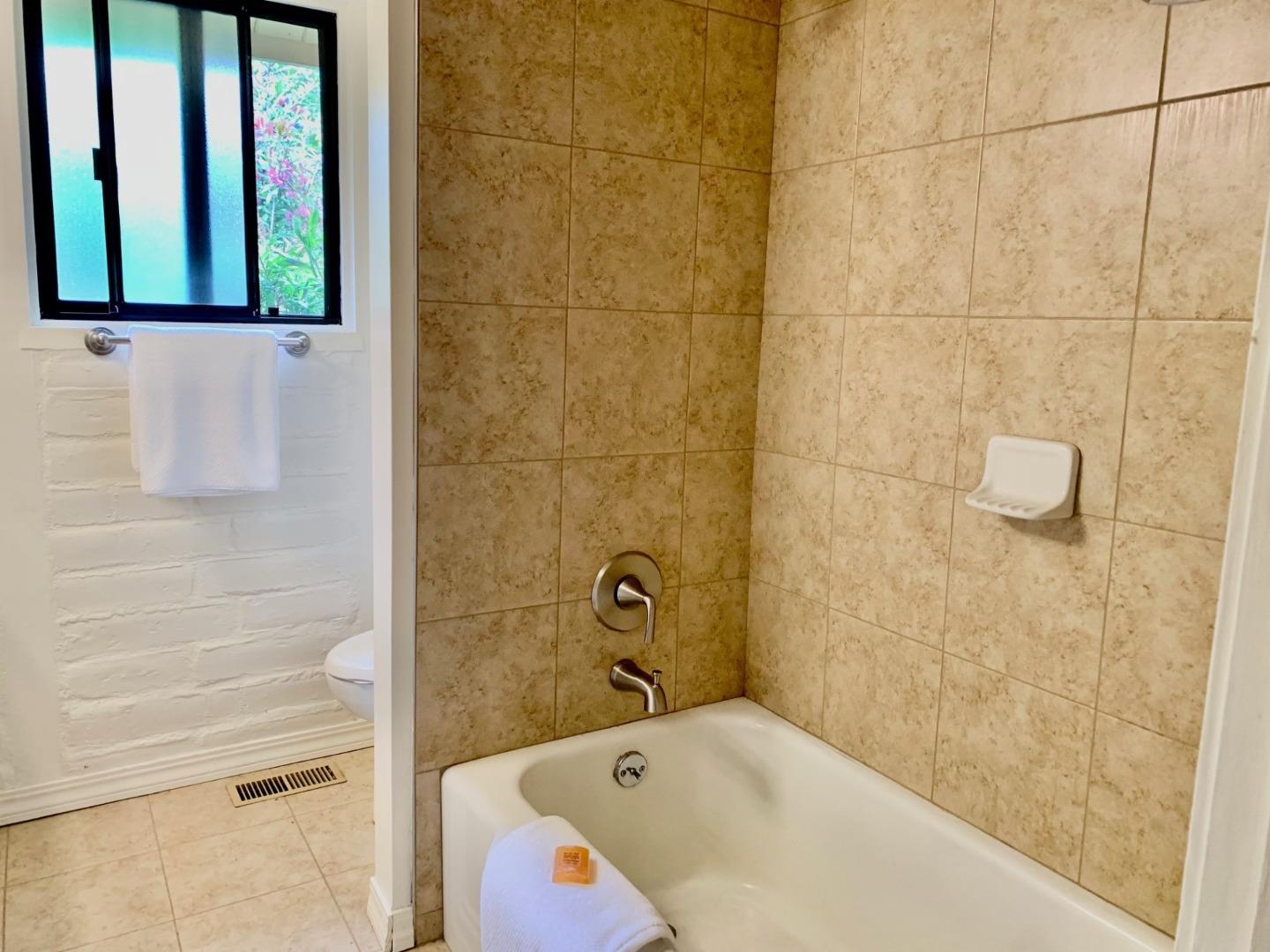 1012 San Carlos Road Pebble Beach, CA 93953 - Photo 10 of 20 a bathroom with a bathtub