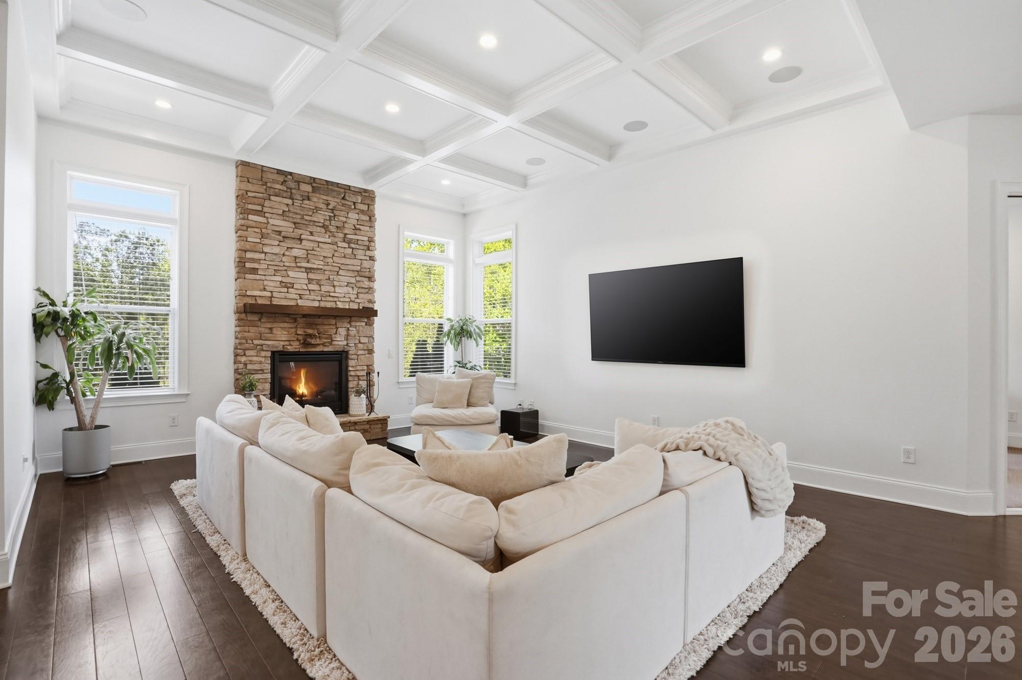 411 Turtleback Ridge Weddington, NC 28104 - Photo 11 of 48 a living room with furniture fireplace and flat screen tv