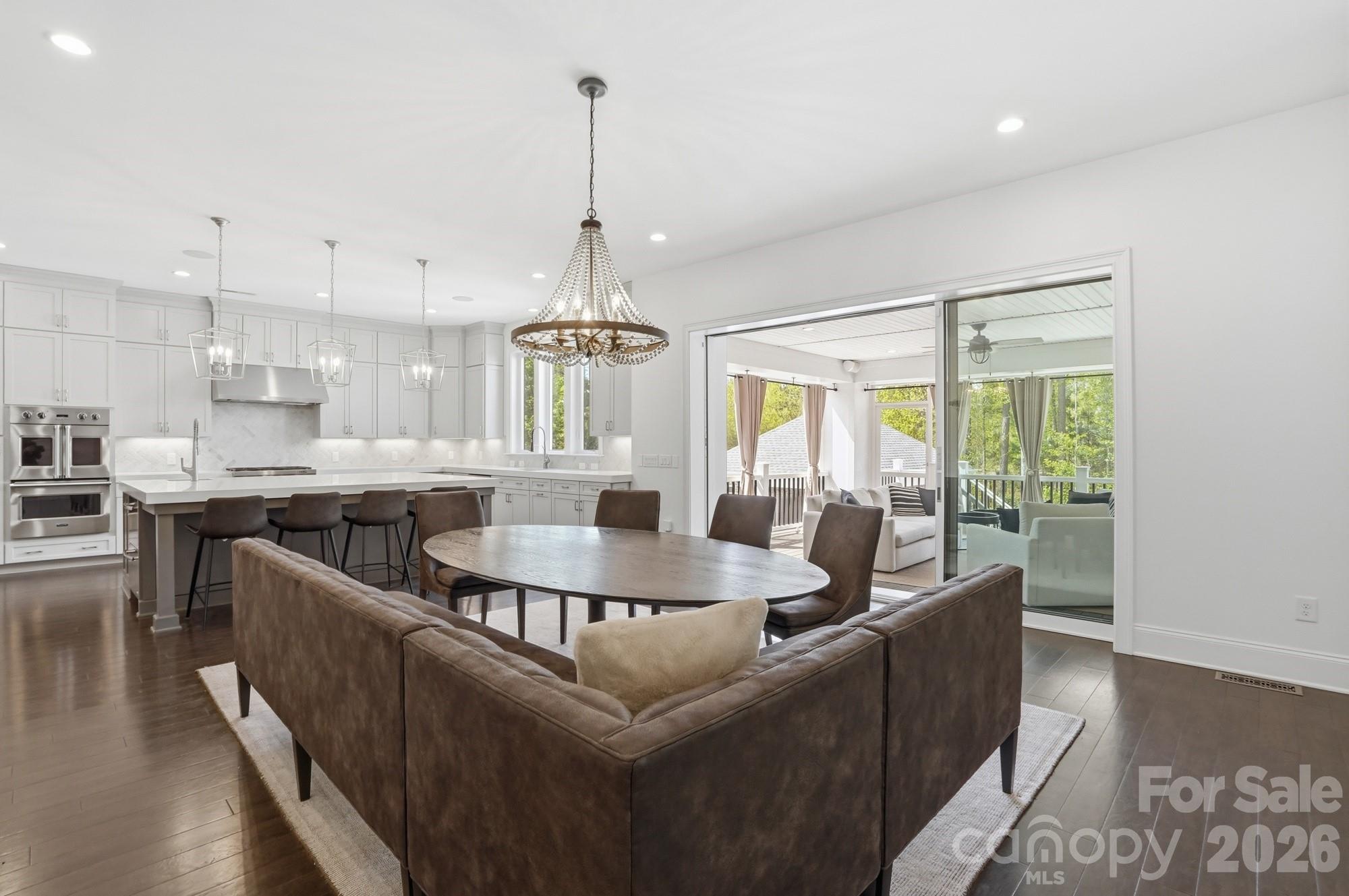 411 Turtleback Ridge Weddington, NC 28104 - Photo 13 of 48 a large kitchen with kitchen island a large counter top