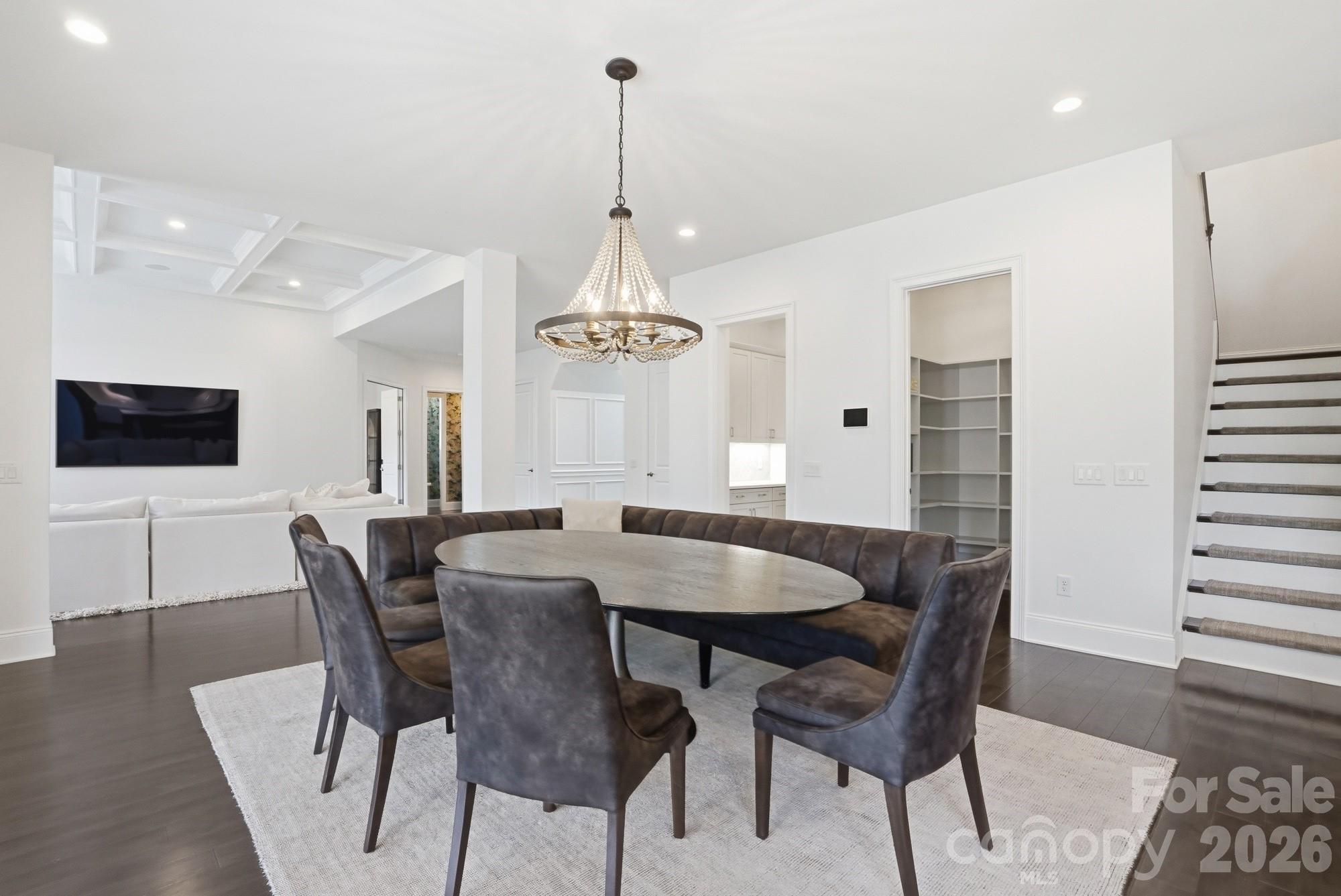 411 Turtleback Ridge Weddington, NC 28104 - Photo 14 of 48 a view of a dining room with furniture and wooden floor