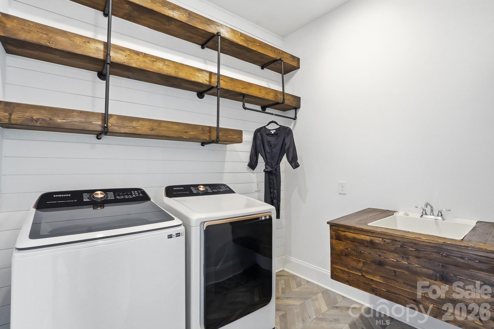 411 Turtleback Ridge Weddington, NC 28104 - Photo 20 of 48 a utility room with dryer and washer